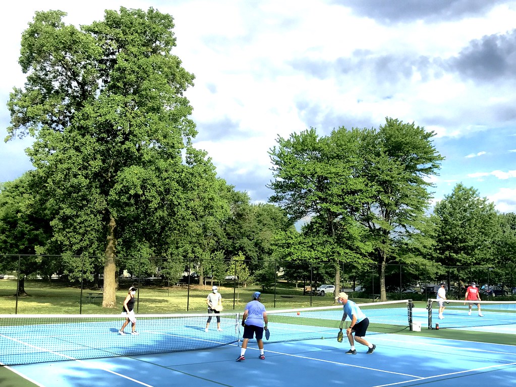 This image shows people playing pickleball.