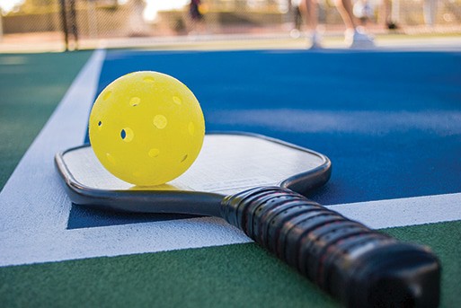 Engage Pickleball vs. Onix Pickleball: In closing, image of pickleball paddle on a court. 