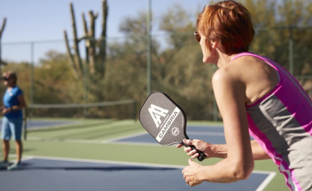 What is a Fault in Pickleball?: Image of people playing pickleball